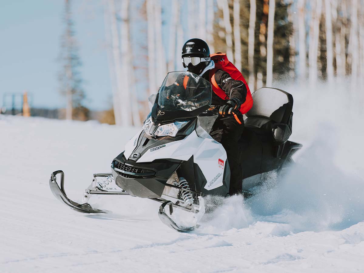 A person using a snowmobile